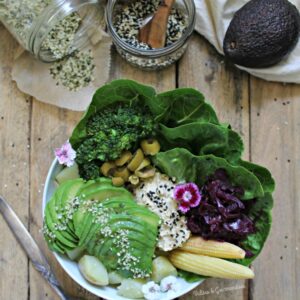 Summer Buddha bowl with steamed potatoes and hummus