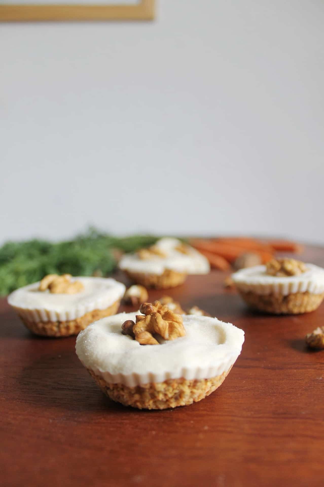 Raw carrot cupcakes with a vegan cheesecake layer