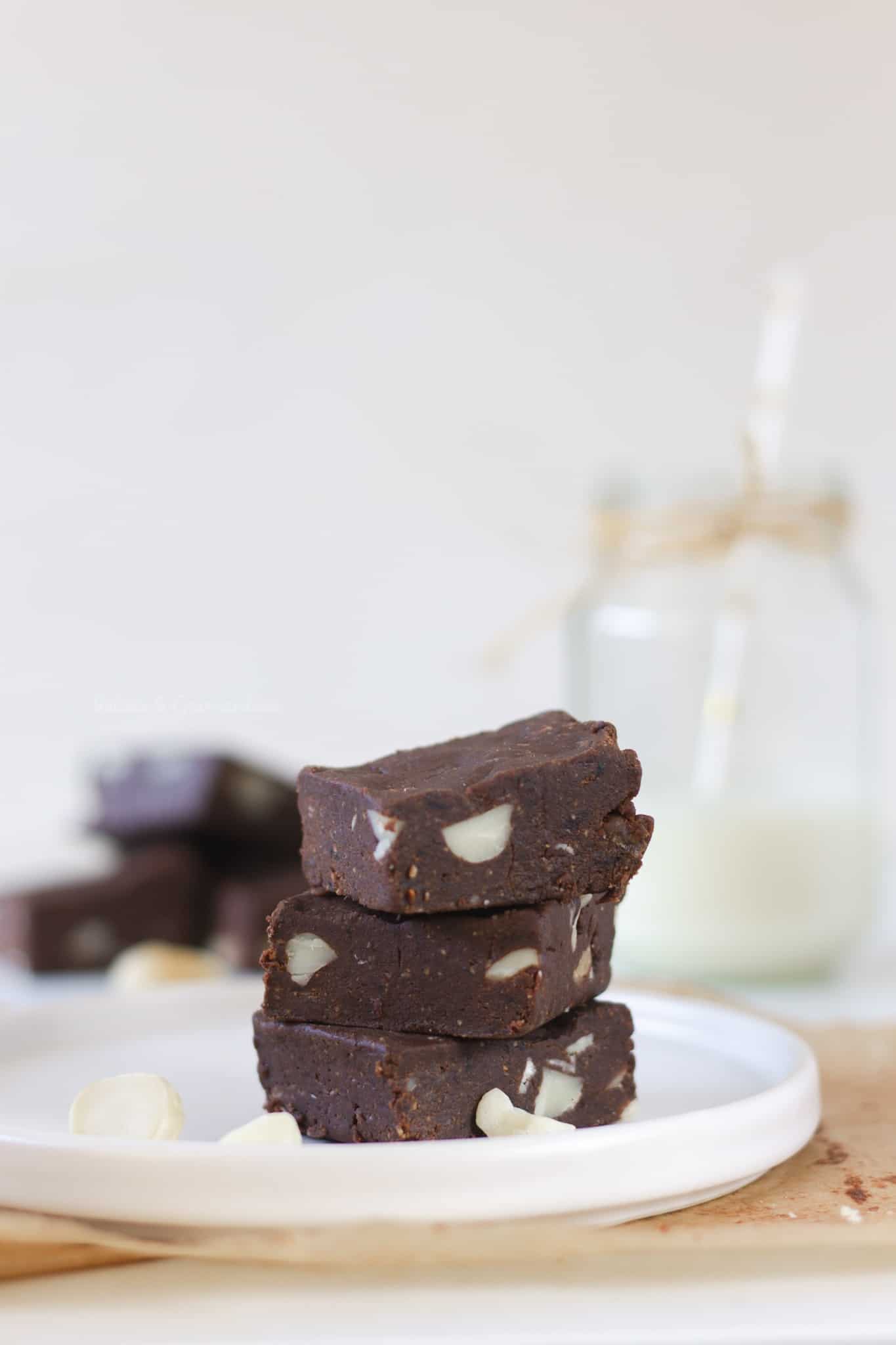 Raw brownies with almond butter, dates, cacao powder and macadamia nuts