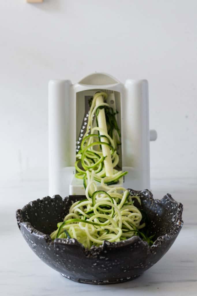 zoodles coming out of the spiralizer